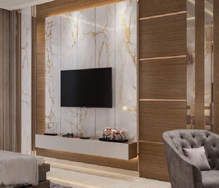 Vách tivi PVC vân đá mang lại vẻ đẹp sang trọng, bền bỉ và tiết kiệm chi phí hiệu quả.